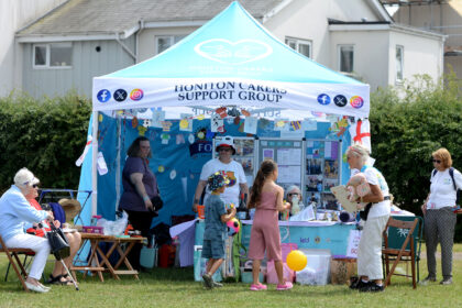 The Honiton Caeres stall at Honiton Market Charter Day 2025