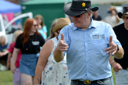 Western Spirit Line Dance Club performing on Allhallows Field at Honiton Market Charter Day 2025.